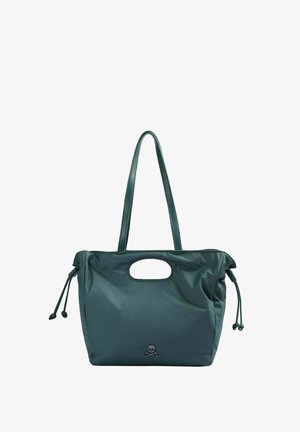 Groene nylon draagtas met een ronde uitsparing voor de handgreep, verstelbare zijknoopjes en een prominent doodskop-en-kruisbottenlogo op de voorkant.