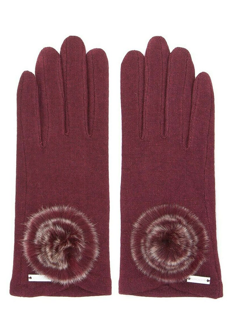 Burgundské pletené rukavice s kulatou umělou kožešinovou pom pom ozdobou na zápěstí. Texturovaná látka, slim fit a žádné viditelné kování.