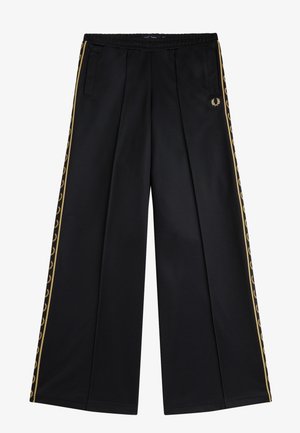 Pantalon de survêtement noir à jambes larges avec bande tapissée d'un logo de laurier doré sur les côtés et une petite couronne de laurier brodée près de la poche droite.