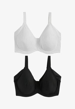 Dva podprsenky na vystavení: jedna biela a jedna čierna. Obe majú nastaviteľné ramienka, hladké košíky a výstuž.