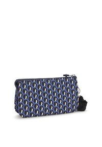Borsa con zip di colore blu navale con un motivo geometrico in blu e grigio. Presenta un accento a pompon nero. Realizzata in tessuto leggero.