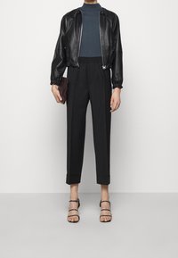 Filippa K Tygbyxor - black