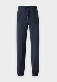 Mørkeblå joggebukser laget av et glatt, lett materiale; har elastisk midjebånd med snøring og smalere ankler.