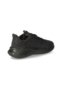 Black athletic shoe with a textured fabric upper, padded collar, and a thick rubber sole. Features three stripes on the side for detail.