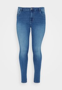 Modré denimové skinny džíny s středně vysokým pasem, designem pěti kapes a jemným vyblednutím, se klasickým zapínáním na knoflík a zip.