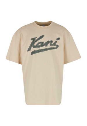 Beesidist puuvillane T-särk lühikeste varrukatega, mille ees on suur roheline script-tüüpi logo "Kani". Lihtne, lõdva istuvusega disain.