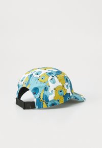 Casquette avec un motif d'ours bleu et jaune, à visière courbée et sangle noire réglable à l'arrière. En coton.