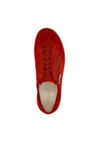 Red suede sneaker with a round toe, lace-up front, and side zipper detail. Features a textured sole and branded insole.