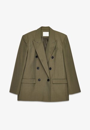 Olive roheline kahekordne ülikond, millel on lõhikud ja mustad nööbid, ning kaks esikotti. Sile kangas ja struktureeritud disain.