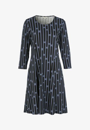 Blå klänning med svarta abstrakta rektangulära mönster, långa ärmar, rund halsringning och flödande A-linjeform som är gjord av mjukt tyg.