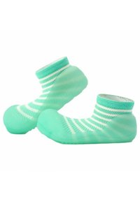Calcetines verde menta con rayas blancas, que presentan una suela de goma flexible y redondeada. Textura suave con un diseño ceñido al tobillo para mayor comodidad.