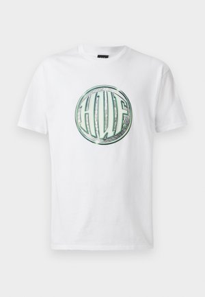 White cotton t-shirt featuring a round, green and gray graphic logo with the text "HUF" in bold letters at the center. Short sleeves, standard fit.