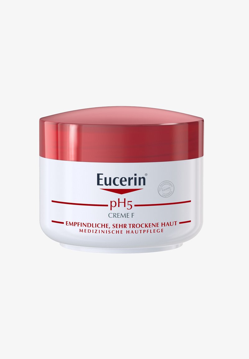 Eucerin pH5 Crème F in einem weißen Behälter mit rotem Deckel. Sie verfügt über eine glatte Textur und ein deutliches Etikett, das die Vorteile für sehr trockene Haut hervorhebt.
