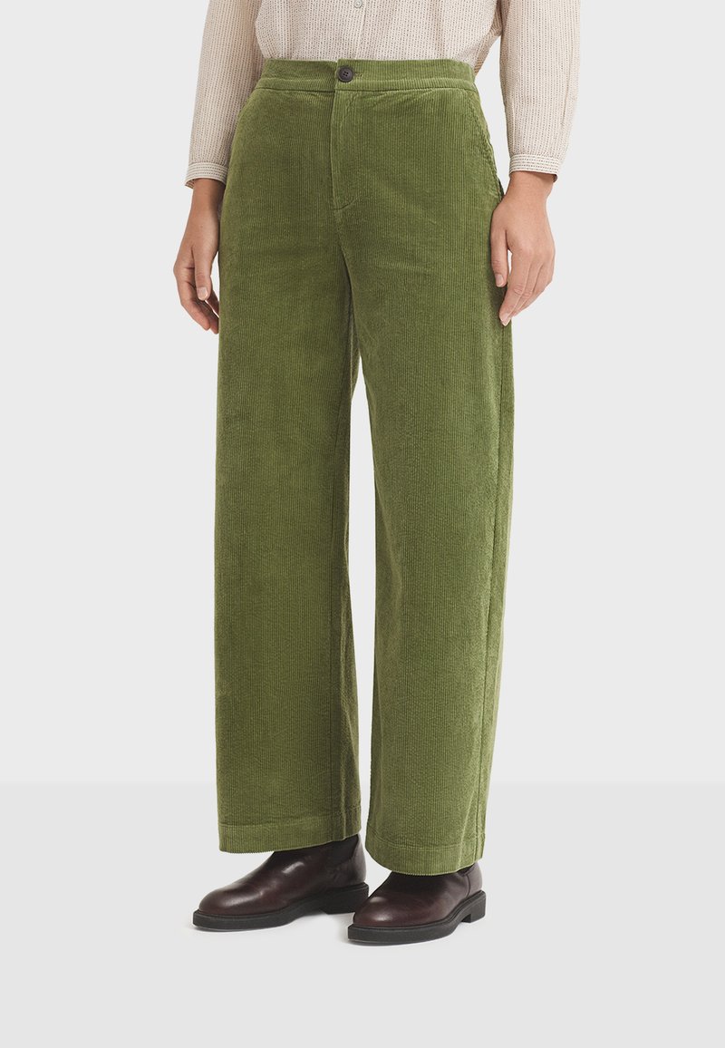 Green corduroy wide-leg pants with a high waist and front pockets, featuring a single button closure and a textured, ribbed surface.