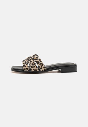 Leopard print slide sandals with a flat black sole. Features two wide straps and a smooth finish on the upper material.