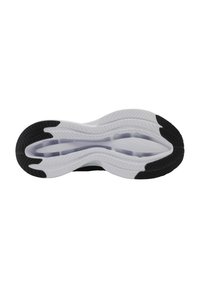 Semelle de chaussure de sport en noir et blanc avec un talon en caoutchouc noir texturé, une semelle intermédiaire blanche striée et des motifs rainurés pour une traction optimale.