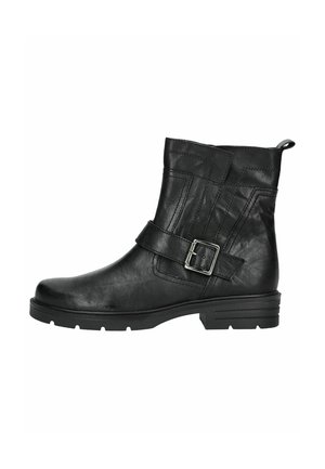 Bottine en cuir noir avec une sangle à boucle sur le côté, talon bas et semelle crantée.