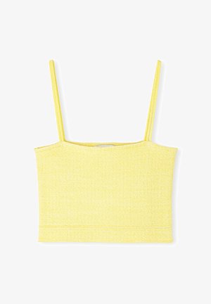 Żółty skrócony top na ramiączkach z cienkimi paskami, teksturowany materiał, prosty dekolt. Charakteryzuje się dopasowanym krojem i czystą linią dołu.