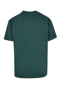 Groene katoenen t-shirt, korte mouwen, ronde hals, effen kleur, lichte stof, eenvoudige snit, geen zichtbare graphics of patronen.
