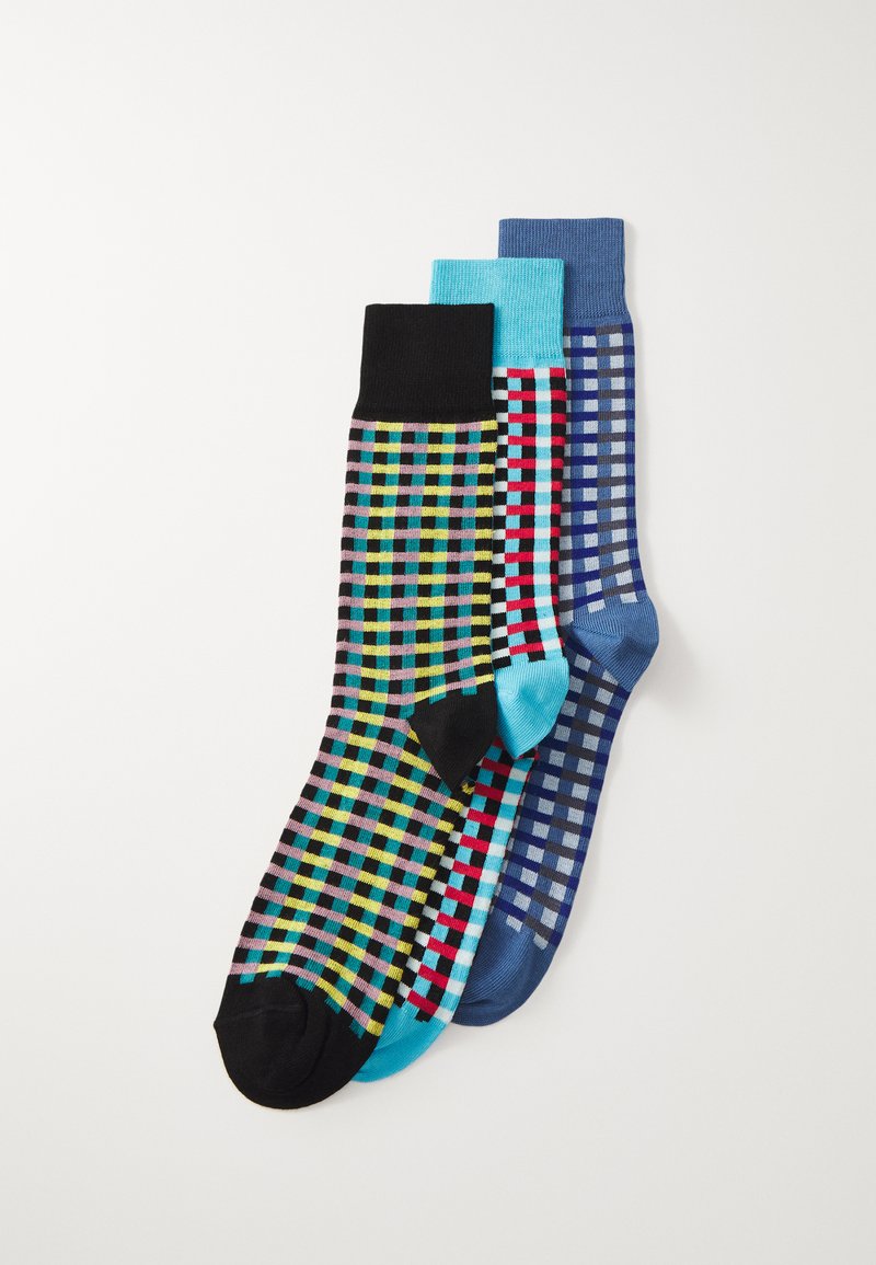 Trois paires de chaussettes mi-mollet avec des motifs en damier. Les couleurs incluent le noir, le bleu, le turquoise, le rouge et le vert sur un tissu tricoté mélangé.