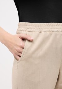 Angels LINN JUMP - Trousers - beige