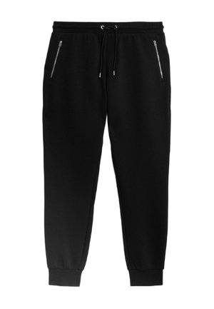 Svarta joggerbyxor med justerbar dragsko i midjan, två sidofickor med dragkedja, ribbade muddar och en mjuk textur.