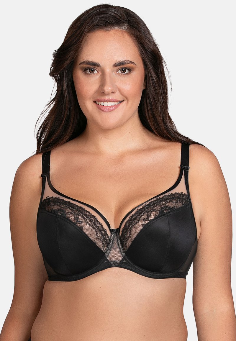 Sostén negro con aros, con detalles de encaje y malla, y tirantes ajustables. Tejido suave con una silueta estructurada para mayor soporte.
