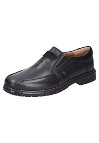 Scarpa nera in pelle con punta arrotondata, pannelli laterali elastici e dettagli/riamo cuciti sulla parte superiore e sulla suola. Suola in gomma resistente.