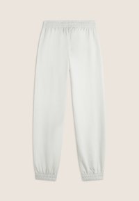 Pantalon de survêtement blanc avec une taille élastique et des poignets, fabriqué dans un matériau doux au toucher lisse, conçu pour le confort et la facilité.
