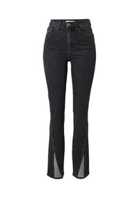 Hoge taille zwarte jeans met een slim fit, voorzien van zijsplitten aan de onderkant, klassiek vijf-pocket ontwerp en een metalen knoopsluiting.