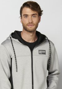 Koroshi Užtrauktuku užsegamas treningas - gris claro vigoré   light grey vigoré
