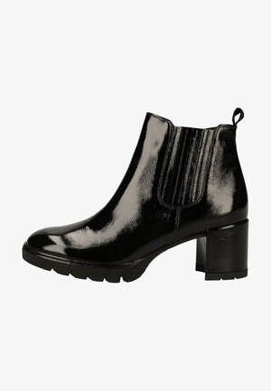 Musta kiiltävä nahka nilkkasaapas, jossa paksu paljas korko, joustavat sivupaneelit ja vetosilmukka. Sileä pinta kiiltävällä viimeistelyllä.