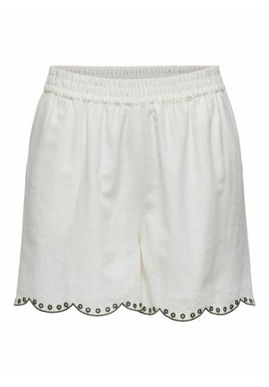 Pantalones cortos blancos de tejido ligero, con un dobladillo en forma de onda y costuras de acento verde, y una cinturilla elástica.