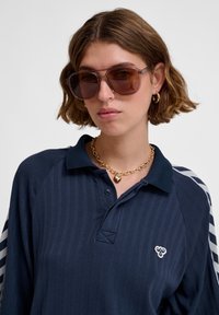 Hummel LOOSE UNISEX - Polo - black iris