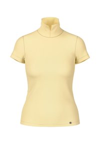 Short-sleeved, high-neck top in light yellow. Smooth texture, minimal seams, with a small circular accent near the hem.