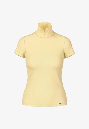 Short-sleeved, high-neck top in light yellow. Smooth texture, minimal seams, with a small circular accent near the hem.