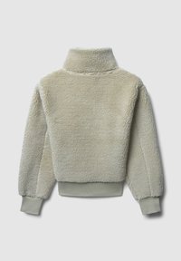 Fleece-Pullover in Hellbeige mit hohem Kragen und elastischen Bündchen. Weicher, strukturierter Stoff mit einer boxy, cropped Passform.