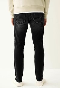 Next SUPER STRETCH COMFORT - Blugi drepți - washed black