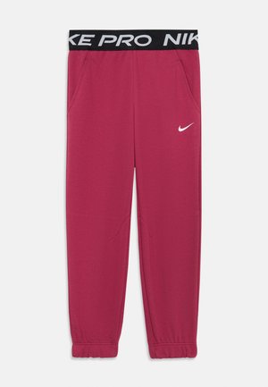 Pantalons de jogging ajustés en tissu rose profond. Dotés d'une ceinture élastique noire avec le texte "NIKE PRO" et d'un logo Nike blanc. Deux poches latérales.