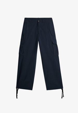 Marina cargobyxor med flera sidofickor, en avslappnad passform, cuffband vid fållen och ett slätt texturerat tyg.