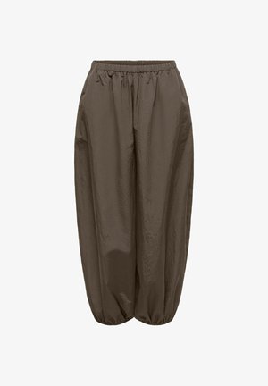 Pantalon ample marron olive avec taille élastique et poignets élastiques froncés, fabriqué dans un tissu légèrement brillant et texturé.