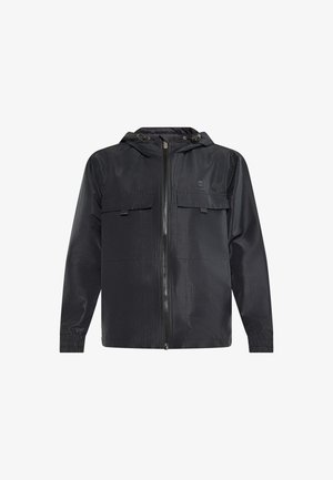 Sort jakke lavet af letvægtsmateriale med lynlås foran, justerbar hætte, to brystlommer og elastiske manchetter for en tæt pasform.