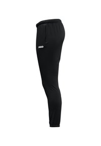 Pantalons de sport noirs au design fuselé, avec une taille élastique et le logo "JAKO" en blanc sur la cuisse supérieure. Texture de tissu lisse.