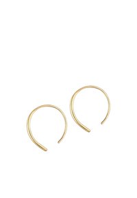 Boucles d'oreilles en or avec un design minimaliste, présentant une forme courbée et lisse avec des extrémités ouvertes, mettant en avant un look moderne et épuré.