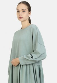 Modanisa MODEST - BENIN - Maxi šaty - green