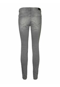 Šedé skinny džíny z denimu s hladkou texturou, které mají dvě zadní kapsy a střední pas.