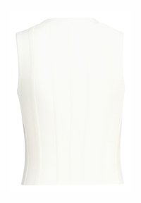 Valkoinen, hihaton paita, jossa on ribbitekstuuri ja pystysuorat raidat. Fitted-muotoilu, pyöreä pääntie ja siistit reunat kädenteissä ja helmassa.