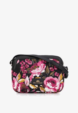 Petit sac bandoulière noir avec motif floral rose et jaune, finition cuir noire, et étiquette de marque Wittchen à l'avant.