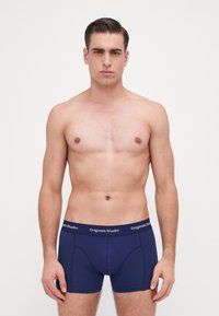 Marineblauwe heren boxershorts met een elastische tailleband, voorzien van het "Originals Studio" logo, gemaakt van soepel stof, met een aansluitend ontwerp.