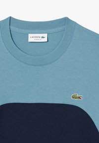 T-shirt med print - navy blue limestone-rill